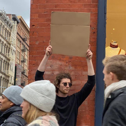 Tipo con cartel de cartón Tipo con cartel de cartón
